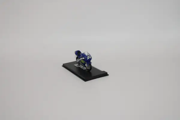 Deagostini blue Honda RS 125R Toni Elias 2001 No. 24 diecast motorcycle for sale on a stand.