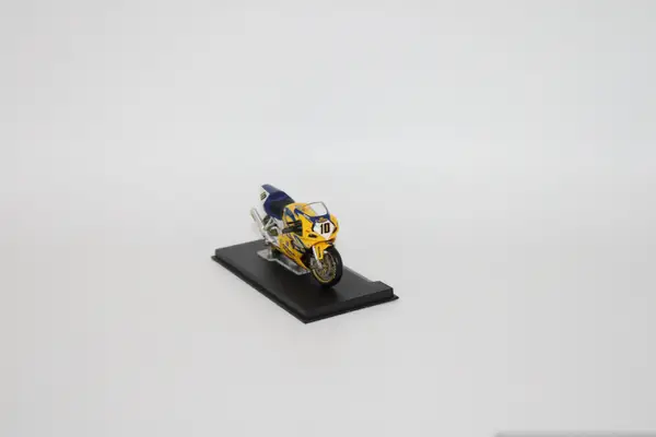 Deagostini yellow and blue Suzuki GSX-R 750 Gregorio Lavilla 2002 for sale on a stand.