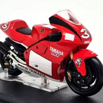 Deagostini red Yamaha YZR500 Max Biaggi 2001 No. 3 diecast motorcycle for sale on a stand.