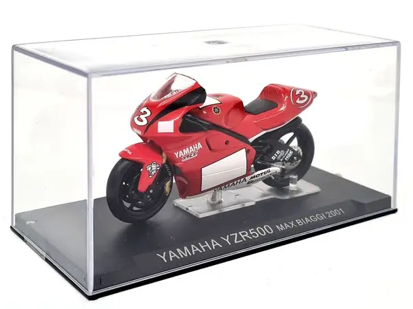 Deagostini red Yamaha YZR500 Max Biaggi 2001 No. 3 diecast motorcycle for sale on a stand in a clear plastic case.